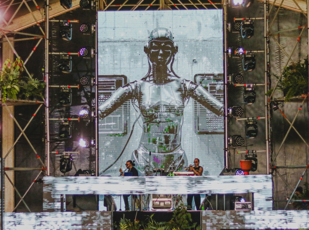 The Dark Wave performing live in front of large-format stage visuals